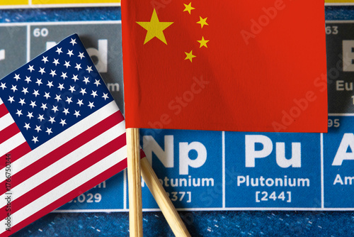 Periodic table with Chinese and American flag.