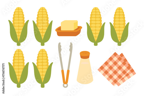 Fresh corn on the cob with butter salt and picnic accessories