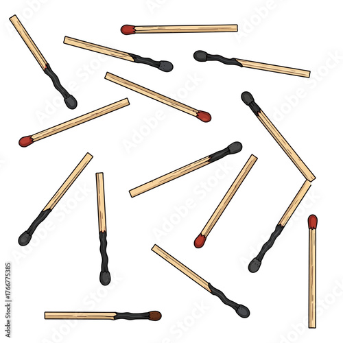 Collection wooden matches with red tips and black heads scattered randomly on