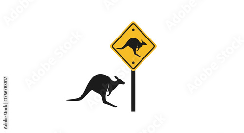 Kangaroo crossing sign with silhouette kangaroo in front it