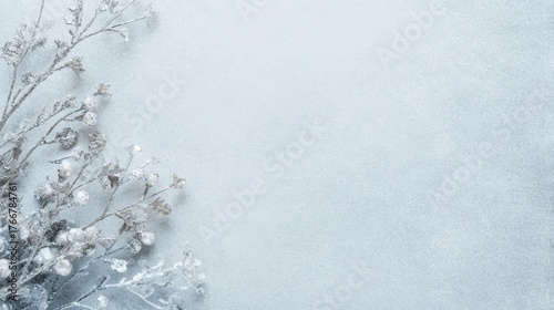 Handmade winter background with white textured paper, silver glitter details and soft blue tones, frosty elegant atmosphere, diffused natural light