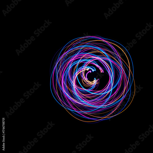 Vibrant Light Swirls on Dark Background, Symbolizing Creativity and Innovation