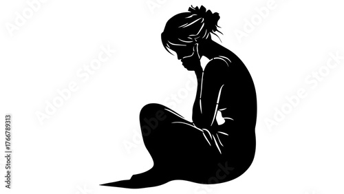 silhouette of a woman sitting on the ground, feeling sad or lost