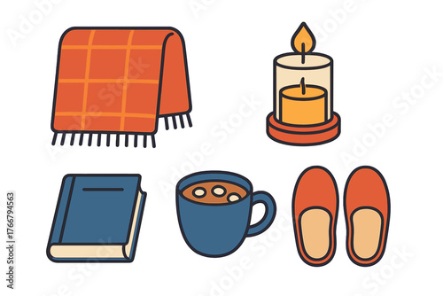 Cozy autumn and winter essentials set with warm blanket candle book hot beverage and slippers