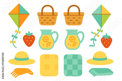 Colorful set of summer picnic essentials featuring kites baskets lemonade and strawberries