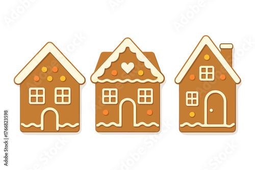 Set of three festive gingerbread houses decorated with white icing and colorful candy on a white background