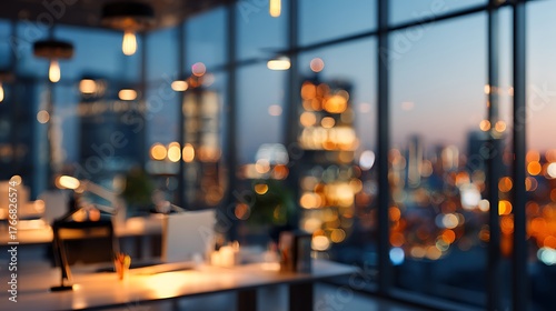 Wallpaper Mural Blurred office interior with city view at dusk featuring desks and ambient lighting fixtures visible Torontodigital.ca