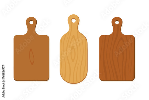 Collection of various wooden kitchen cutting boards featuring different shapes and tones