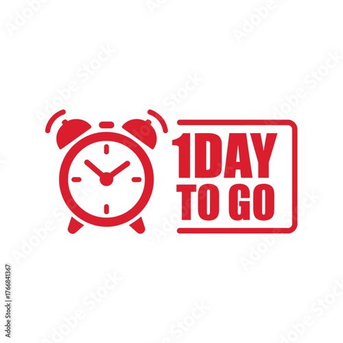 Alarm clock and red sign showing one day left until an event or deadline