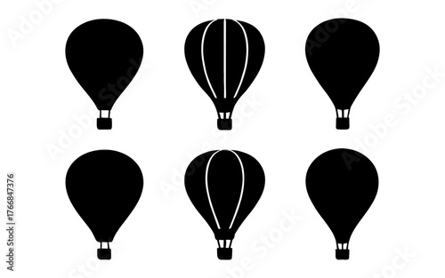 Silhouette hot air balloon set featuring black shapes and patterns