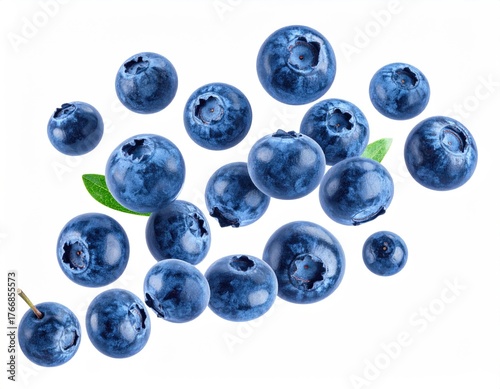 Isolated Group of Ripe Blueberries Floating Against White Background