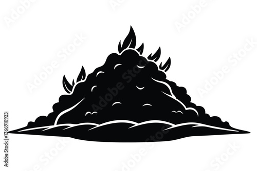 Black foliage emerges from a rugged mound, creating a striking organic silhouette