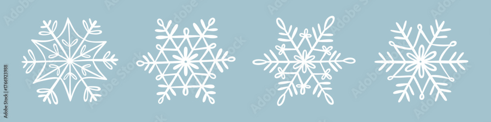 Fototapeta premium Snowflakes doodles set. Winter hand-drawn illustration. Vector design elements