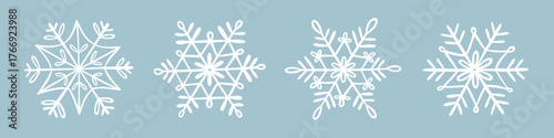 Snowflakes doodles set. Winter hand-drawn illustration. Vector design elements