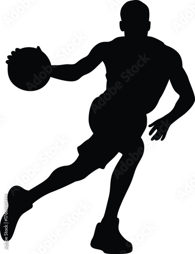 Silhouette of a basketball player dribbling the ball with athletic movement and focus