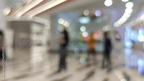 Wallpaper Mural People walking inside a modern shopping mall, blurred interior view Torontodigital.ca
