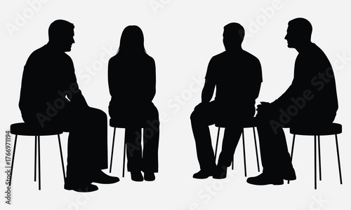 Group discussion concept showing four anonymous people in silhouette coming together for a support or business meeting