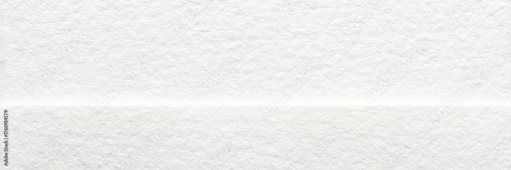 Obraz premium White textured paper background with subtle horizontal line and fibrous surface details.