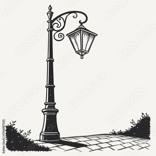 Vintage street lamp with ornate details and cobblestone path lamppost gas lamp