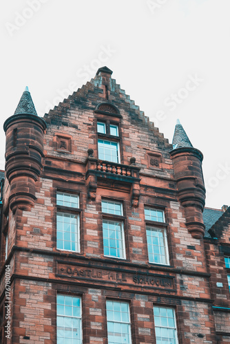 Castle Hill School, a historic building designed by architect Robert Wilson, featuring classic Scottish Baronial architecture with distinctive bartizan turrets and stone detailing.