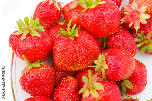 Close up, top view. background from freshly harvested strawberries, directly above. group of fresh strawberries closeup