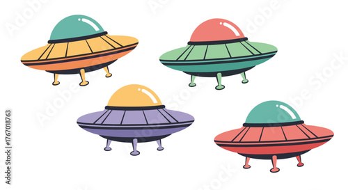 Four cute and colorful cartoon flying saucers, also known as UFOs, floating against a white background.