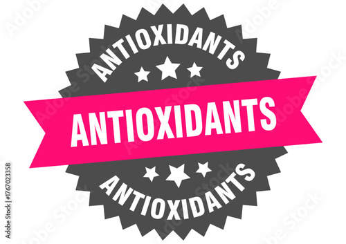 antioxidants. antioxidants round pink label isolated on transparent background
