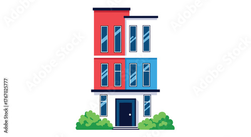 Colorful modern residential building with red, white, and blue sections, numerous windows, a dark blue front door, and symmetrical green shrubbery.