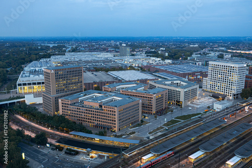 Evening view of Cologne Koelnmesse and railway tracks