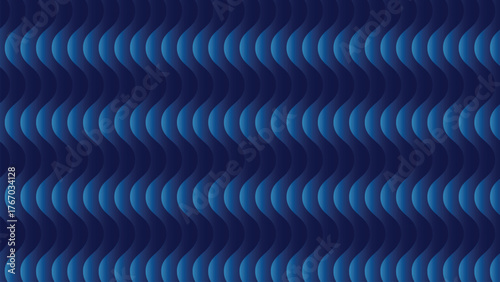 Close up of a dark blue textured surface with a repeating curved pattern and shadows cast