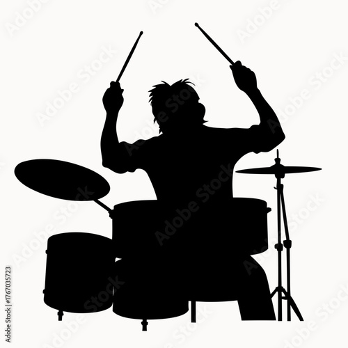 Silhouette of a drummer playing a drum set with cymbals and drumsticks in a musical performance stage