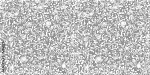 Silver glitter texture with sparkling light reflections creating a festive and elegaant background. Perfect for luxury packaging, holiday cards, invitations, and stylish creative projects.