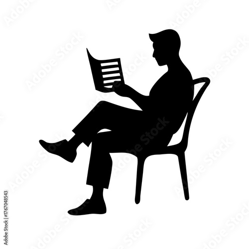 Silhouette of a man sitting in a chair reading a document with his legs crossed in a relaxed position