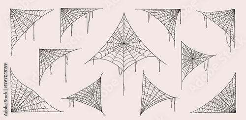 A set of spooky corner cobweb illustrations with dripping details, isolated for Halloween and gothic design projects