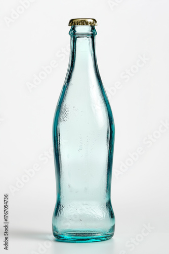 Wallpaper Mural Clear glass bottle on white background, minimalistic blank container ideal for mockup and product presentation. Torontodigital.ca