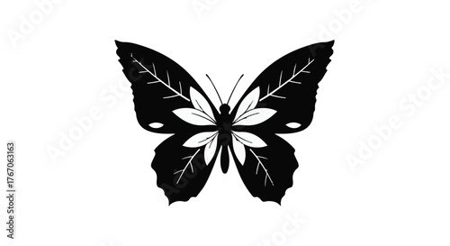 Elegant black butterfly with floral wing pattern on a clean white background