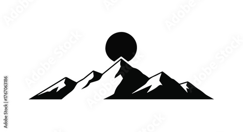 Majestic mountain range silhouette against a dark sun, symbolizing adventure and nature's grandeur.