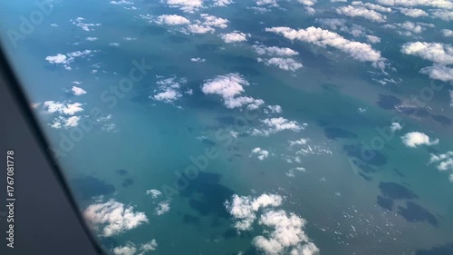Aerial View Of Scattered Cumulus Clouds Over English Channel (La Manche), North Sea | Blue Ocean Surface, Sky From Airplane Window