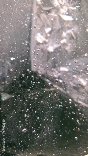 Clear cracked stained hand blown glass artwork abstract background