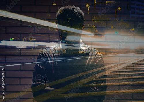 Unrecognizable man in a dark room, stressful incitement, with head down, Portrait of , fear, anxiety, sadness, abuse, depression, loneliness, criminal .