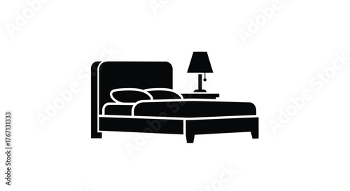 Simple black silhouette of a bed with pillows and bedside lamp