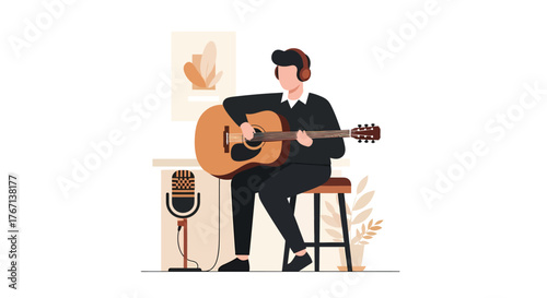 Man playing acoustic guitar while wearing headphones in recording studio, showcasing musical passion and creative expression in a modern, minimalist style.