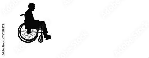 Silhouette of a person in a wheelchair against a white background
