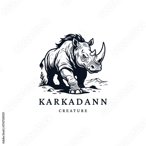 Powerful monochrome illustration of a mythical Karkadann (one-horned rhino) creature charging forward in a threatening pose, rendered in a vintage woodcut style