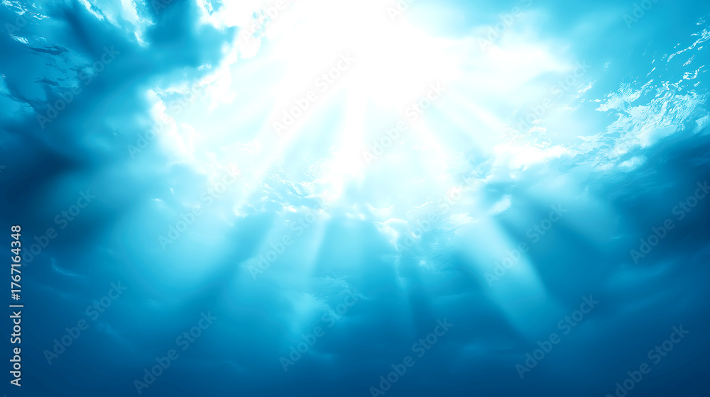 Obraz premium Sunbeams Piercing the Ocean Surface 