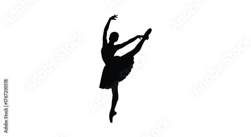 Elegant silhouette of a ballerina performing a graceful arabesque pose on pointe shoes