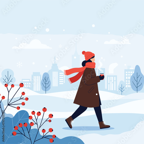 Woman in a warm coat, hat, and scarf walking in winter with a cityscape background and snowy weather, holding a steaming beverage.