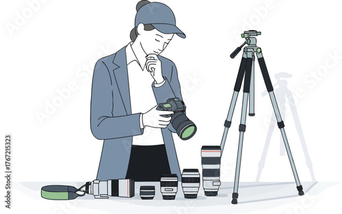 Contemplative photographer reviewing camera equipment, lenses, and tripod for creative photoshoot prep