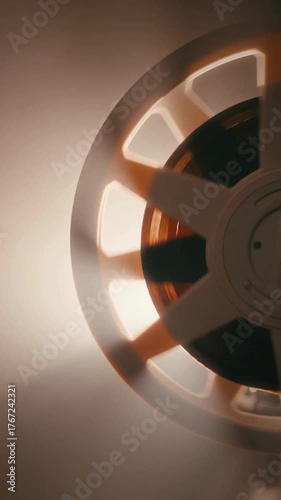 Vintage film projector showing old movie reel for entertainment history lesson