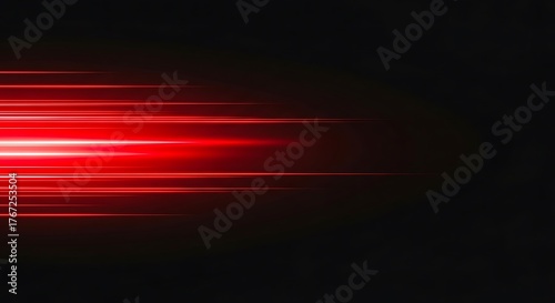 Red light trails streak across a dark background creating a sense of speed